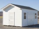 Custom Front Entry Peak Shed with White Vinyl Siding from Pine Creek Structures